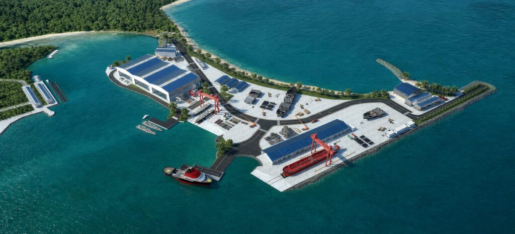 Aerial view of the BlueGen Marine shipyard site at Ponnani, Kerala, showing the waterfront facility and berthing area